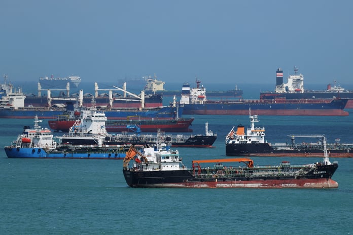 Oil tankers sailing through contested waters amid Iran IRGC operations in the Strait of Hormuz