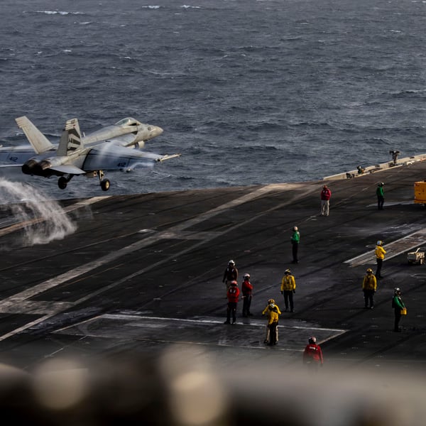 F/A-18E Super Hornet launches from the flight deck of the USS Abraham Lincoln during Iran war operations in the Persian Gulf