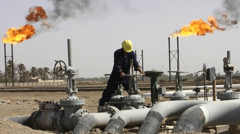 Iraqi oil worker at a refinery near Basra as Turkey and Iraq sign the Kirkuk-Ceyhan pipeline deal