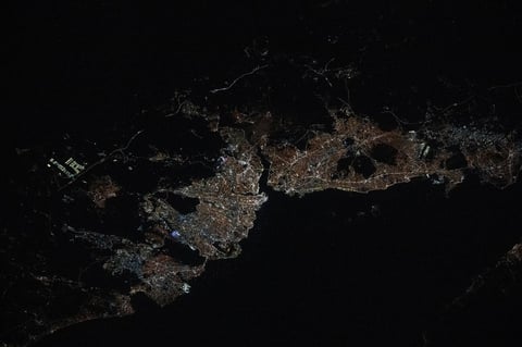 Istanbul city lights at night showing the Bosphorus Strait connecting the Sea of Marmara to the Black Sea photographed from the International Space Station
