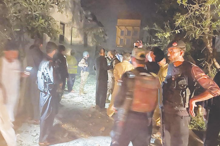 Security personnel at Kabal police station in Swat district Pakistan following a blast