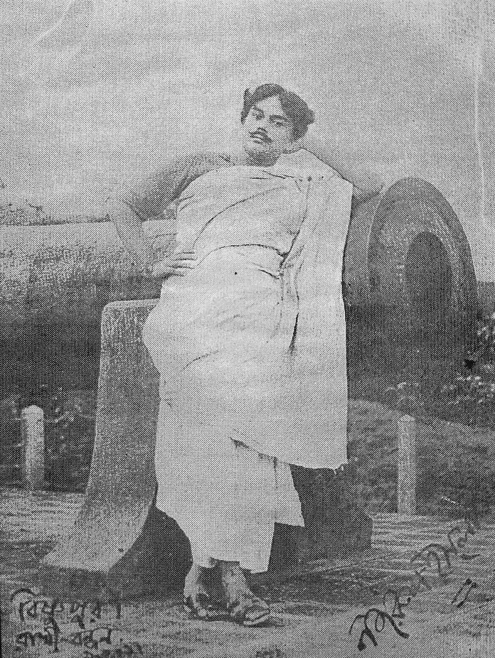 Kazi Nazrul Islam photographed around 1921, the year he wrote the poem Bidrohi