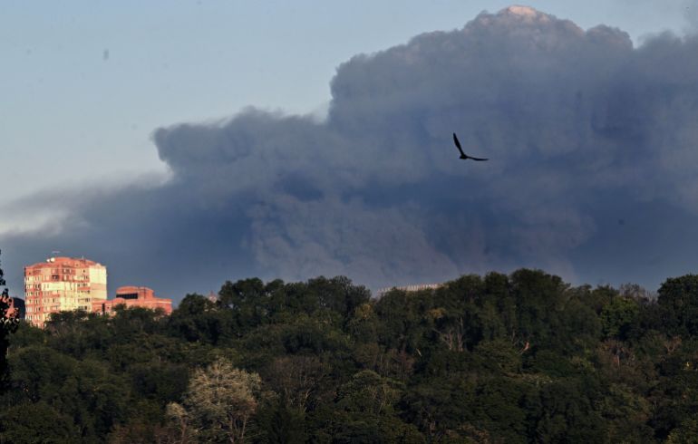 Smoke rising over the Kyiv region after Russian drone strike on ammunition warehouse in Myla village August 28 2026