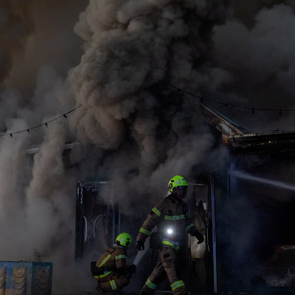 Ukrainian rescuers work at the site of a Russian strike in Kyiv on August 16, 2026