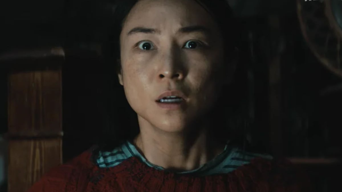 Greta Lee as Ann looking shocked inside the sealed house in Netflix thriller The Last House