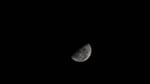 Last Quarter Moon photographed from the International Space Station showing the half-lit lunar disk