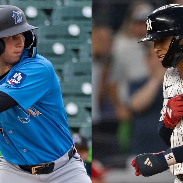 George Lombard Jr. in Yankees pinstripes and Jacob Lombard in Jupiter Hammerheads uniform on night of their simultaneous debuts