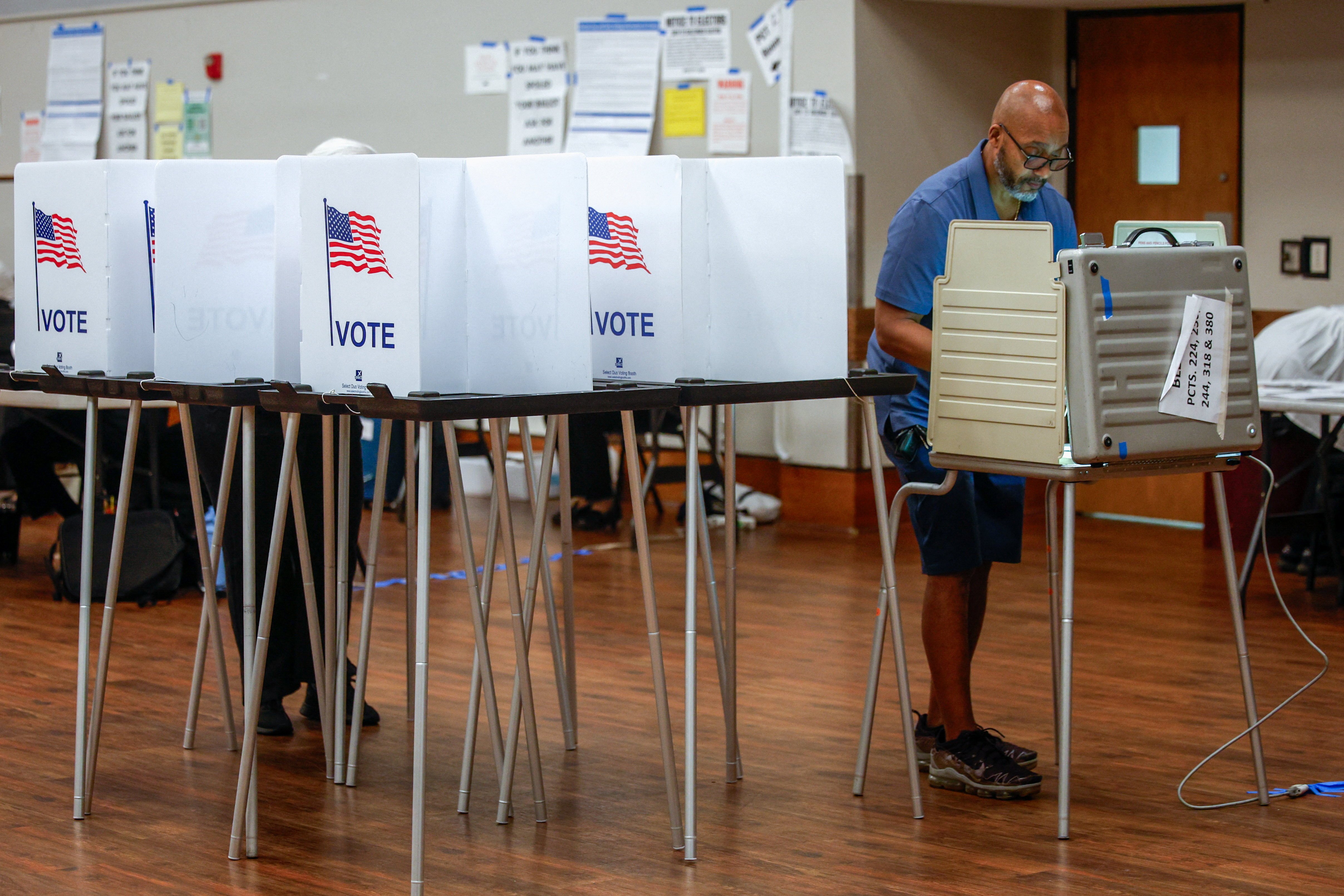 A voter casts a ballot at a Detroit polling station during Michigan's Democratic Senate primary on August 5 2026