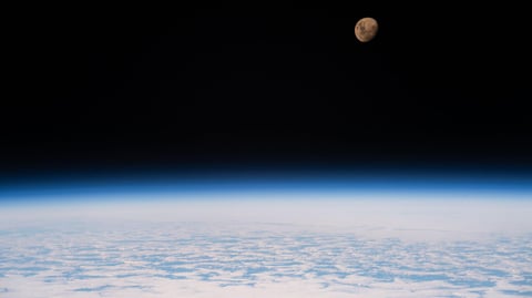 The moon phase today is a waxing gibbous, seen here above a cloudy Indian Ocean from the International Space Station