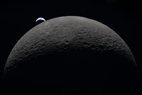 Waning crescent moon phase August 2026 with Earth in background from NASA lunar imagery