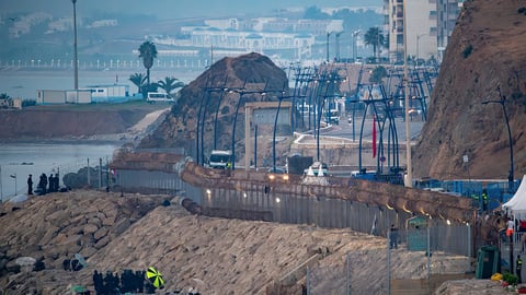 Moroccan security forces and navy fast boats deployed near the Ceuta border fence to block a social-media-organized mass crossing attempt on August 16, 2026