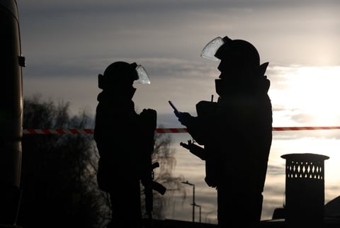 Emergency response personnel at the site of a blast in Russia
