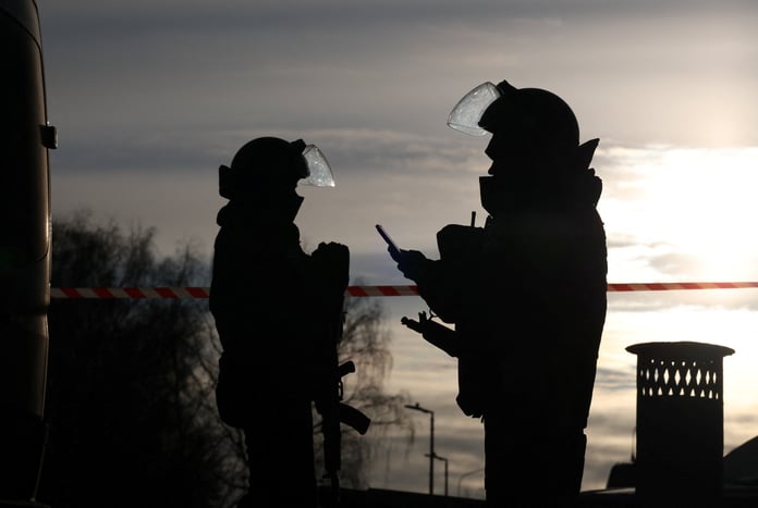 Emergency response personnel at the site of a blast in Russia
