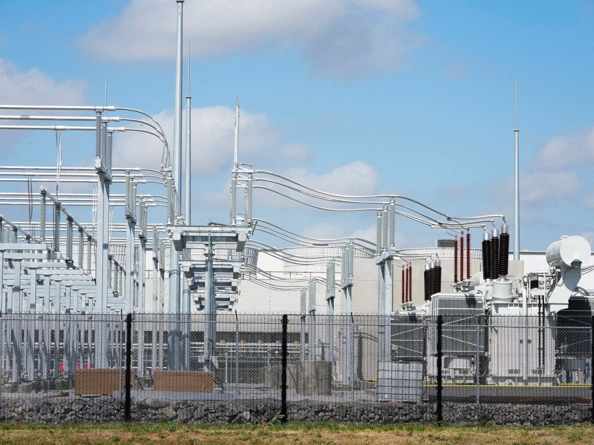 MSFT stock today: high-voltage grid equipment at a substation serving a United States data centre, the physical form of hyperscaler capital spending