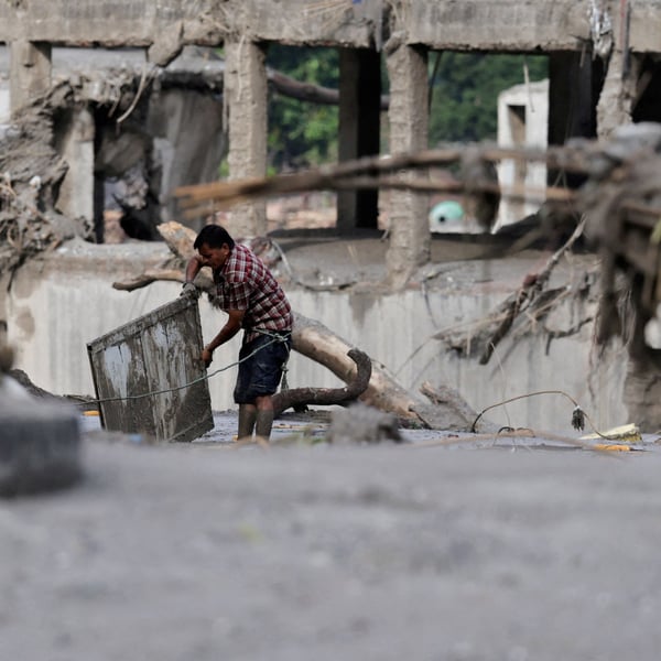 Rescuers search for survivors along Nepal's flooded Trishuli River valley after a glacier collapse in Rasuwa district, August 2026