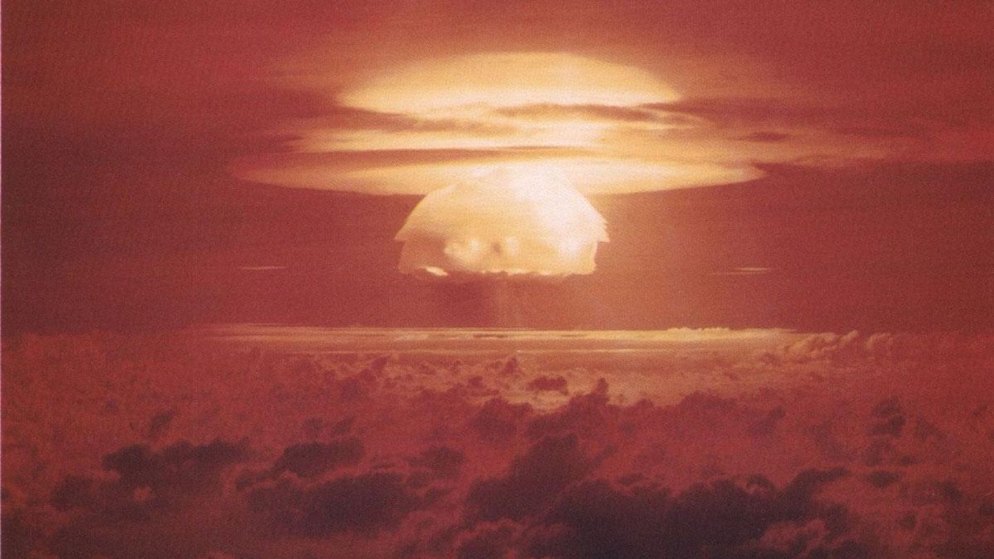 Nuclear weapons mushroom cloud representing proliferation risks in Middle East amid US-Saudi nuclear deal