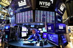 Traders on the floor of the New York Stock Exchange as S&P 500 hits record high on flat July PPI data