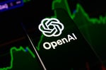OpenAI logo displayed in green neon on a dark background