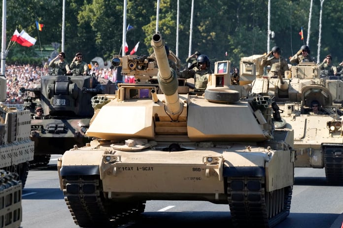 US-made Abrams tanks take part in a Polish military parade in Warsaw