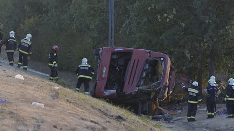 Rescue workers at the scene of the Polish bus crash on Hungary's M3 motorway near Mezőkeresztes