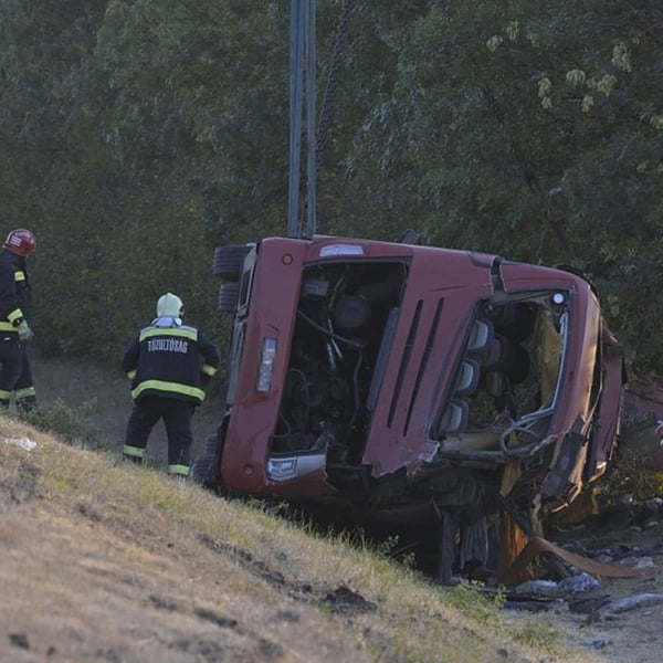 Rescue workers at the scene of the Polish bus crash on Hungary's M3 motorway near Mezőkeresztes