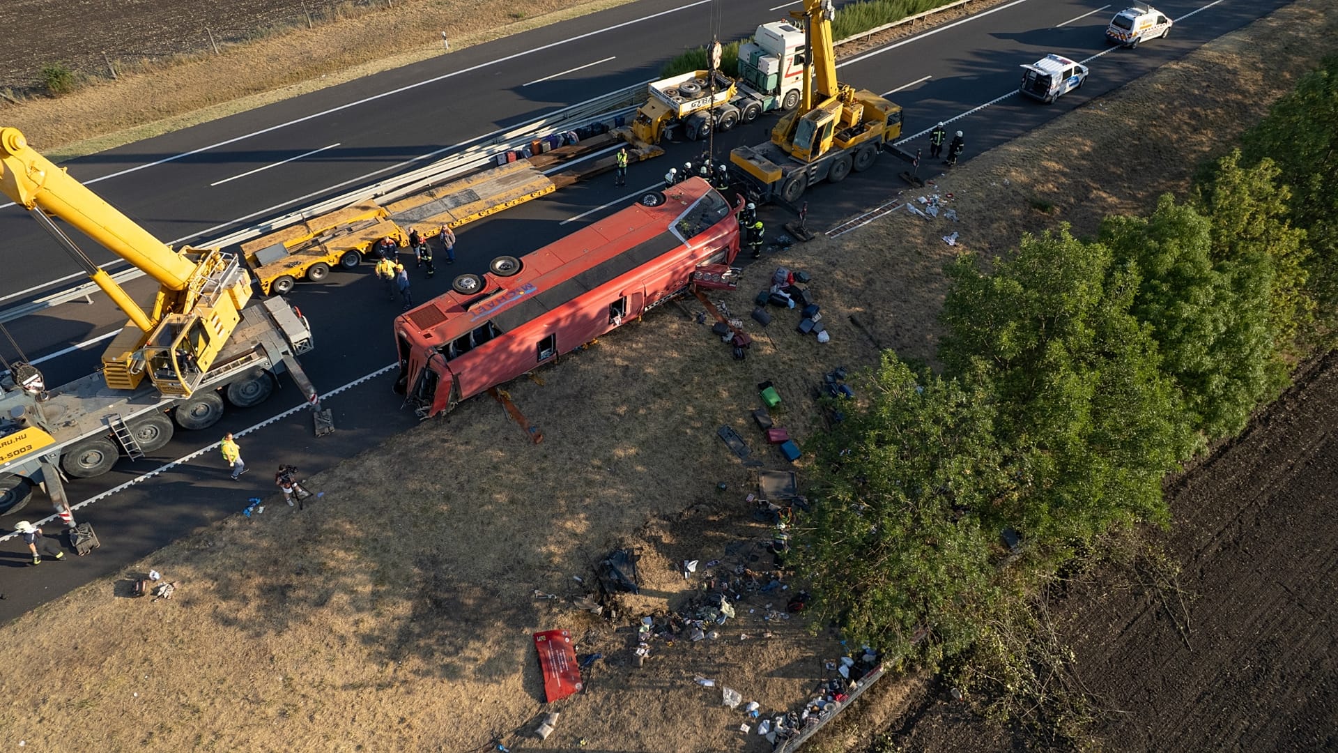 Rescue teams and emergency services at the scene of the Poland pilgrims bus crash on M3 motorway in Hungary