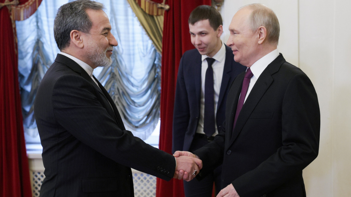 Russian President Vladimir Putin meets Iranian Foreign Minister Abbas Araghchi in St Petersburg as Russia-Iran ties deepen