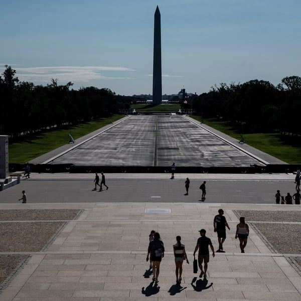 Visitors walk near the drained Lincoln Memorial Reflecting Pool in Washington DC after Trump botched renovation