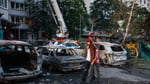 Aftermath of Russian ballistic missile attack on Kyiv August 1 2026 with damaged buildings and emergency responders
