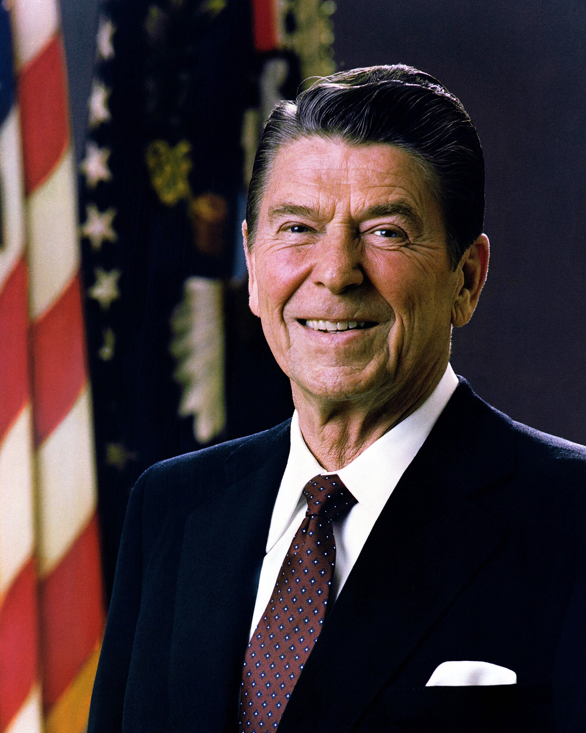Ronald Reagan in a dark suit in his 1981 official portrait as the 40th president of the United States