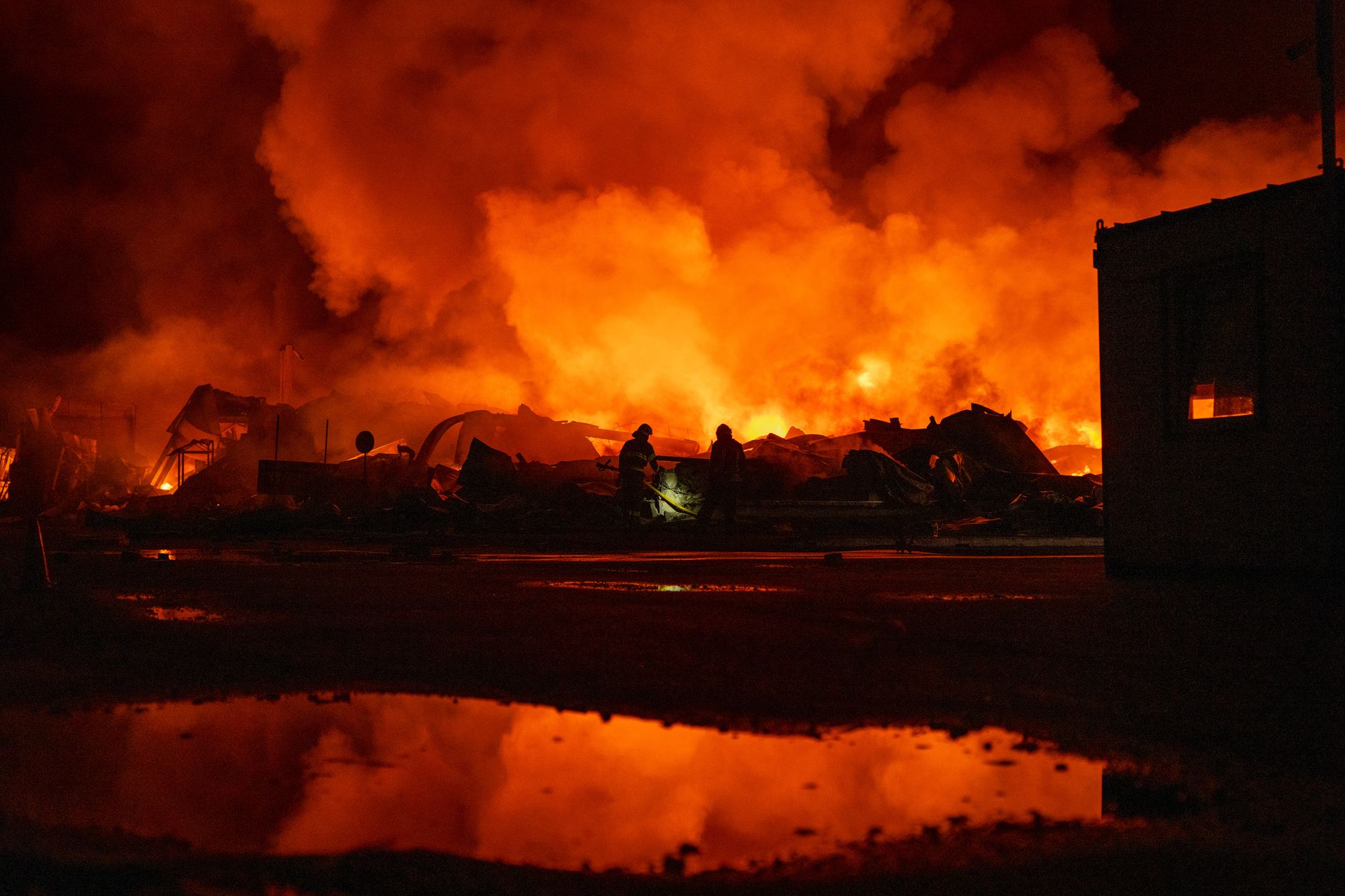 Emergency crews at the scene of a Russian missile strike in Kyiv Oblast August 5 2026