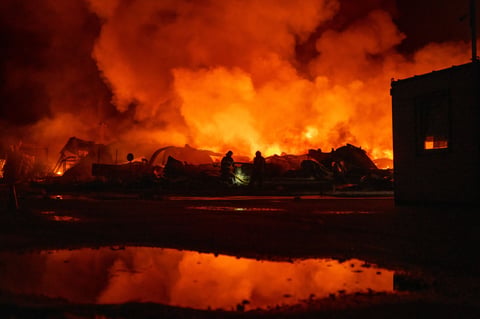Emergency crews at the scene of a Russian missile strike in Kyiv Oblast August 5 2026