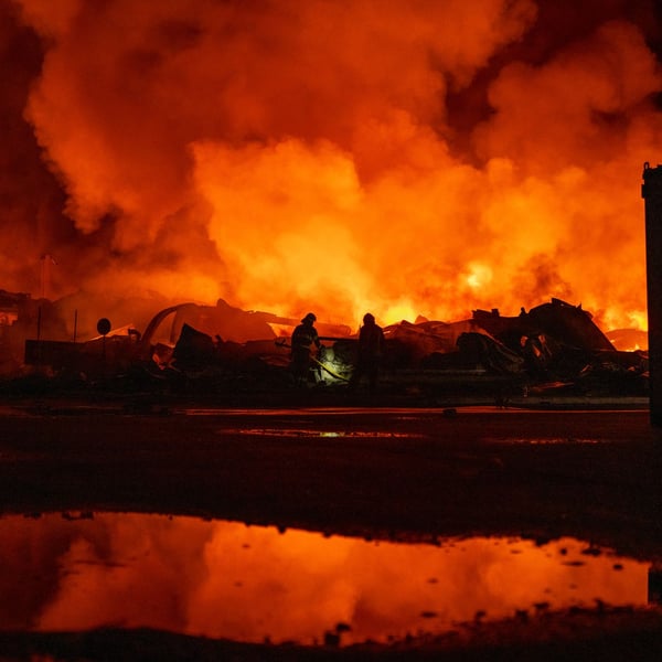 Emergency crews at the scene of a Russian missile strike in Kyiv Oblast August 5 2026