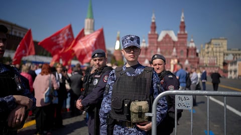 Russian police and National Guard servicemen patrol Red Square in Moscow April 2022