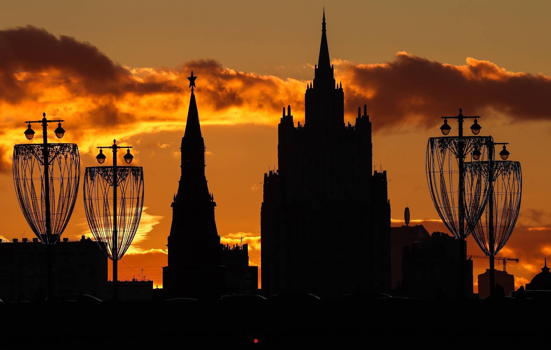 The Russian Foreign Ministry building silhouetted against a sunset sky in Moscow