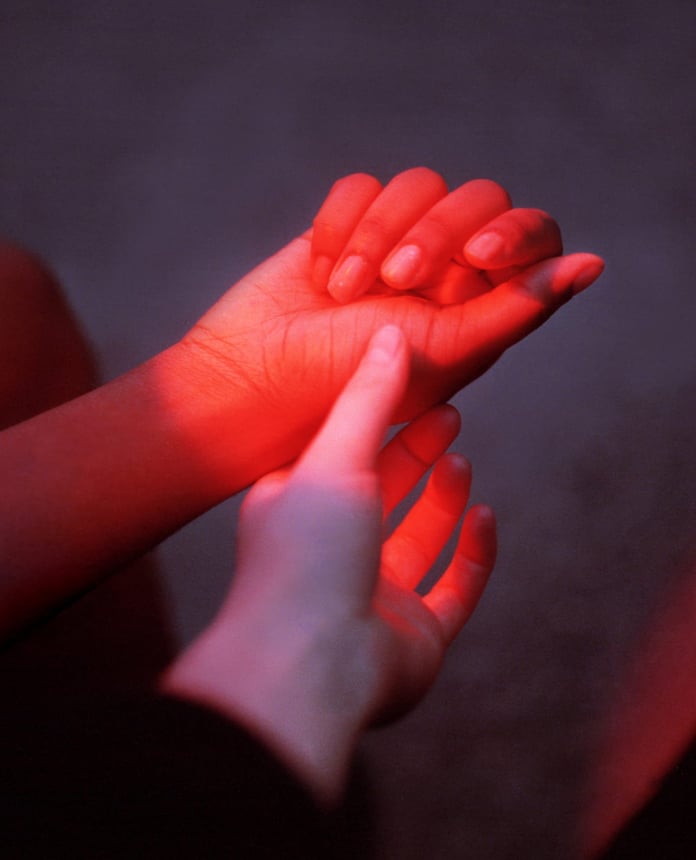 Woman reflecting on sexual health and mental wellness, illustrating research link between sexual frequency and depression