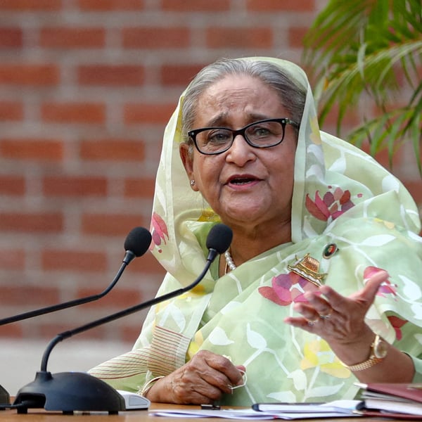 Sheikh Hasina addresses reporters at a press conference, speaking from exile in New Delhi