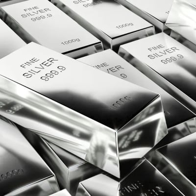 An employee displays a silver bar in a safe deposit room, the metal behind the silver rate today quoted across Indian cities