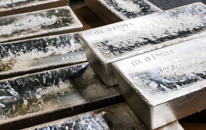 Freshly cast silver ingots stamped with serial numbers stacked at a refinery, illustrating silver rate today and silver price today movement