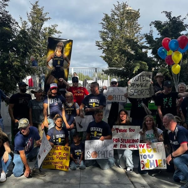 Sophie Night rally supporters gather outside Target Center before Indiana Fever vs Minnesota Lynx WNBA game