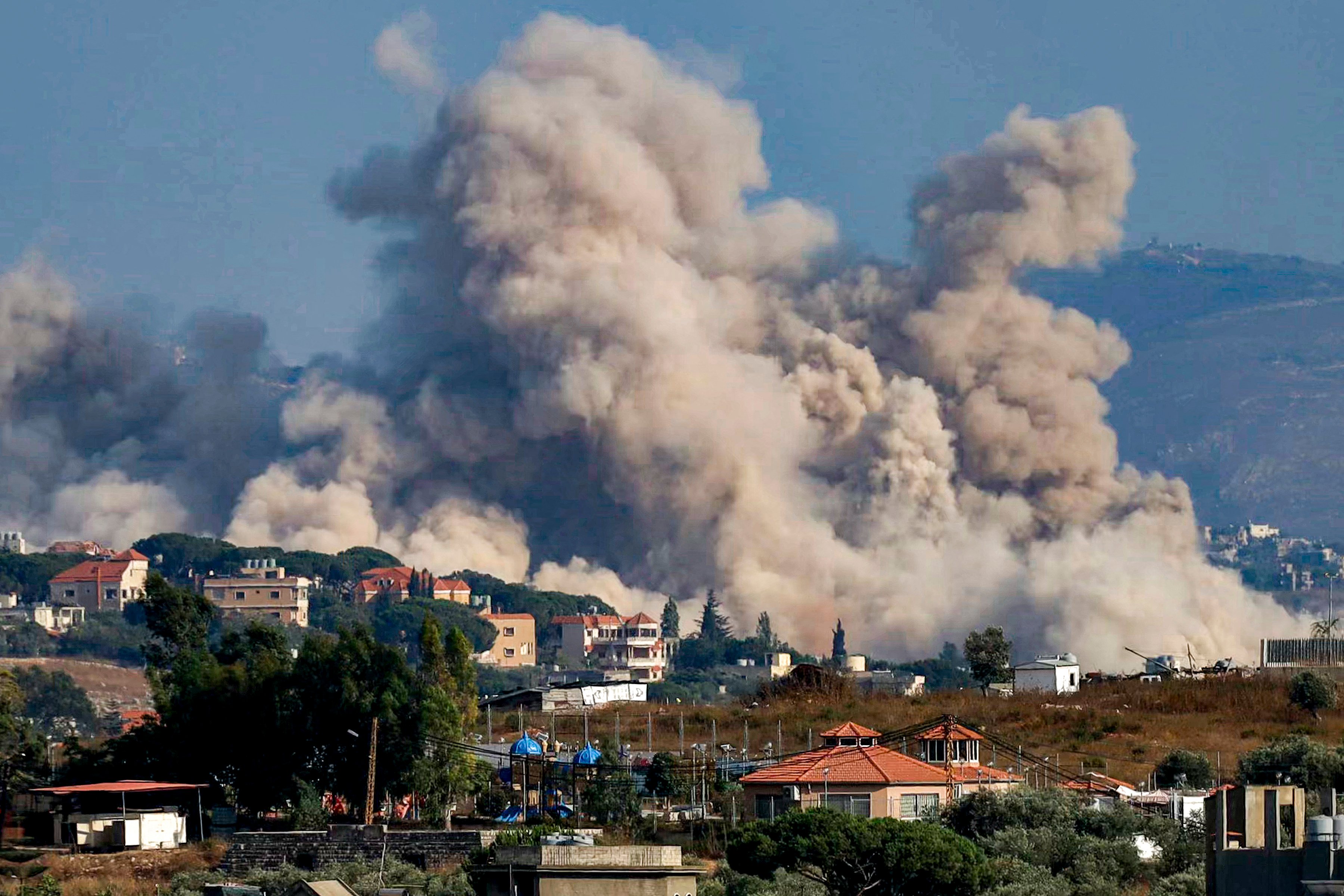 Smoke rises over southern Lebanon village of Kfartibnit as seen from Nabatieh following Israeli military operations in July 2026