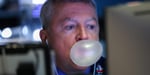 S&P 500 today: a trader blows a chewing gum bubble while working on the floor of the New York Stock Exchange