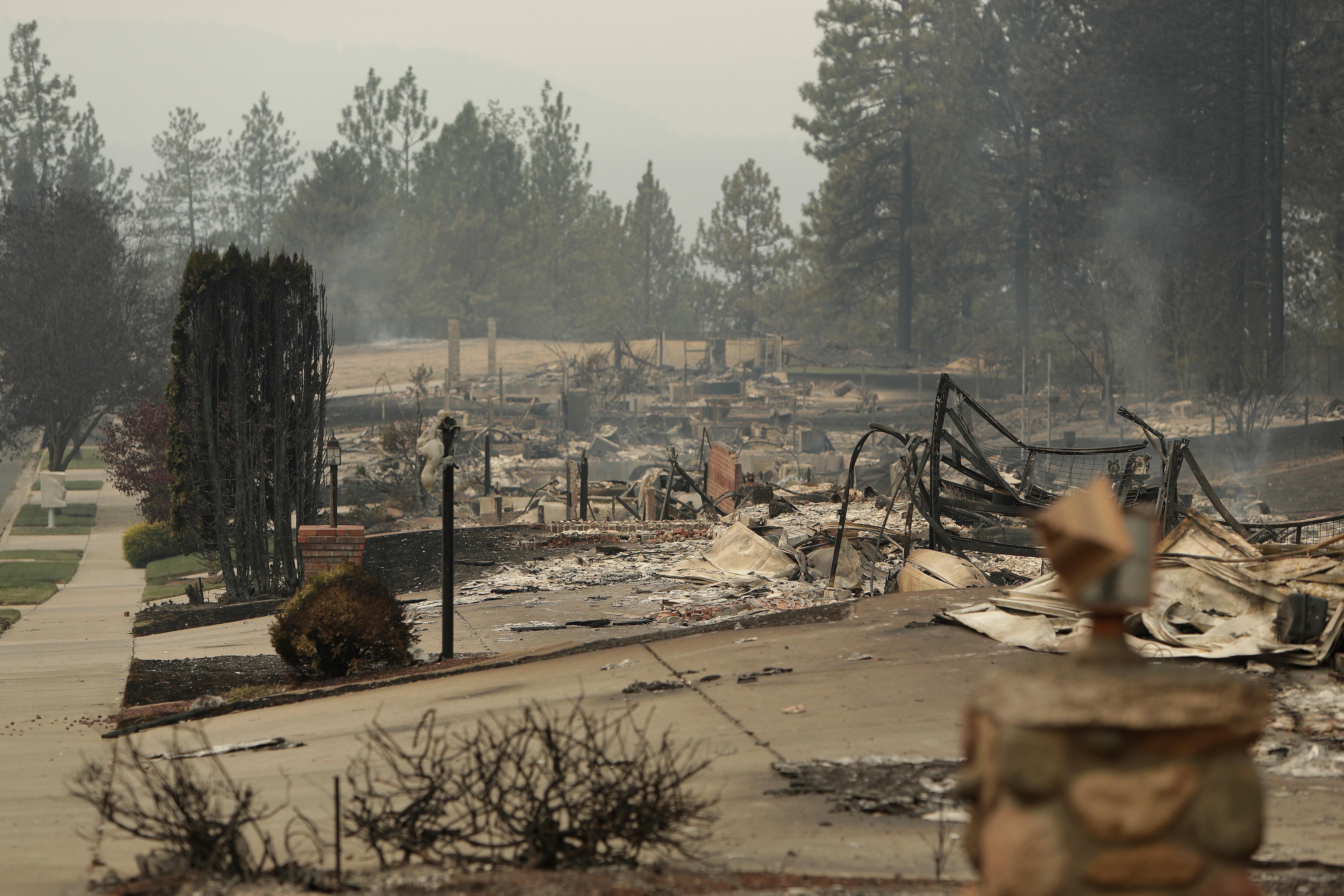 Structures burned to ash on West Tiffany Avenue in Spokane after the Old Trails Fire destroyed homes and buildings in August 2026