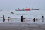 Commercial vessels anchored in the Strait of Hormuz off Bandar Abbas Iran August 2026