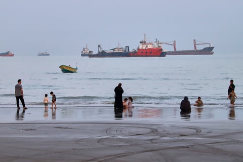 Commercial vessels anchored in the Strait of Hormuz off Bandar Abbas Iran August 2026
