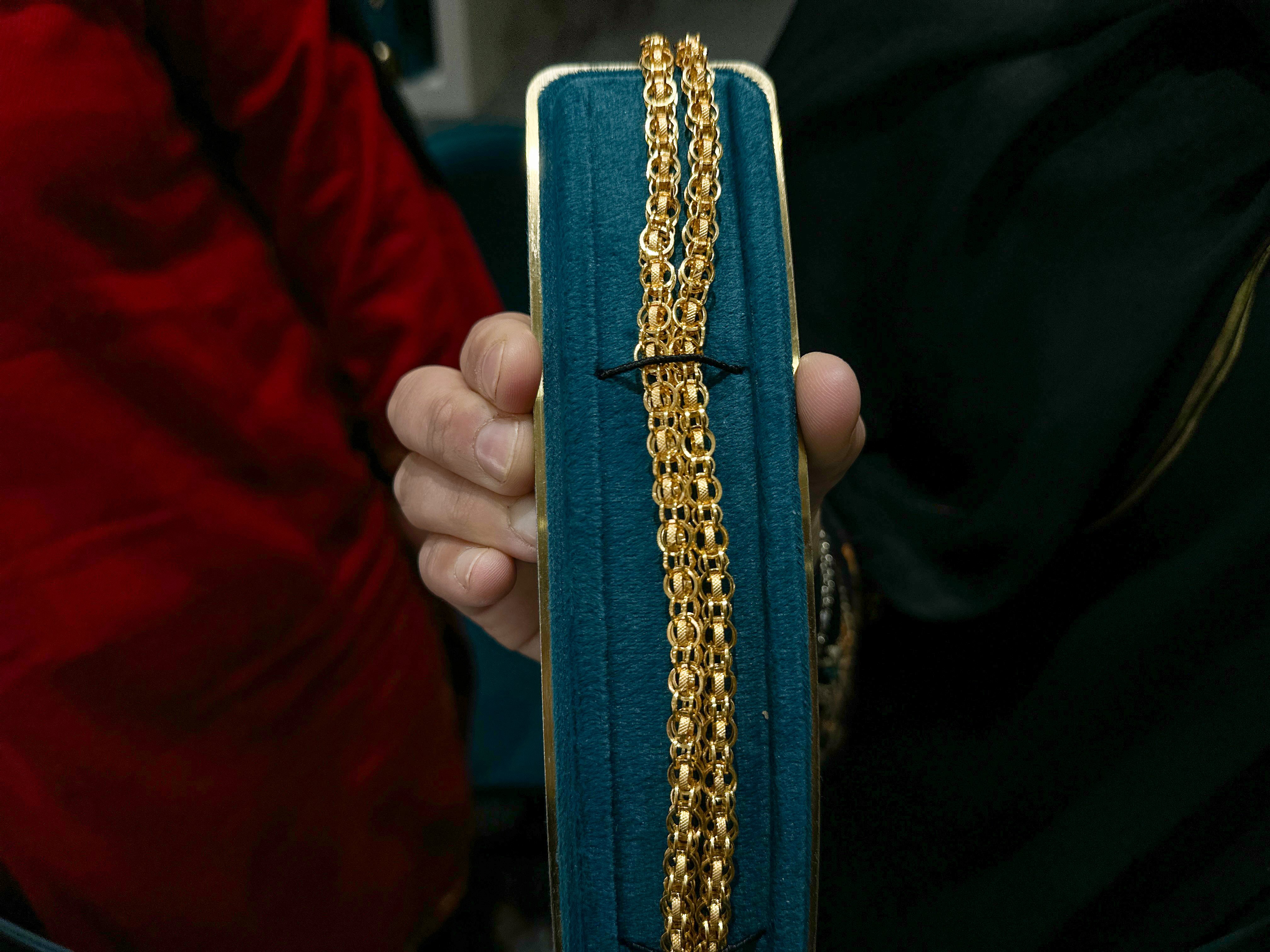A one gram gold chain displayed in an Indian jewellery shop as buyers switch to lighter pieces at today gold rate levels