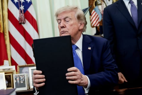 President Donald Trump signs new executive orders targeting birthright citizenship and birth tourism at the Oval Office on August 6, 2026
