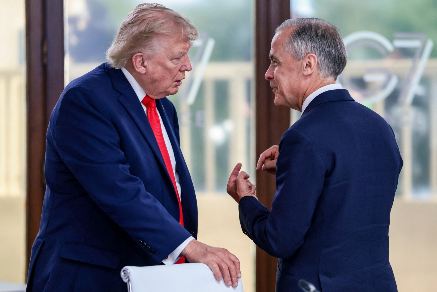 US President Donald Trump and Canadian PM Mark Carney amid escalating trade war over 50% auto tariffs