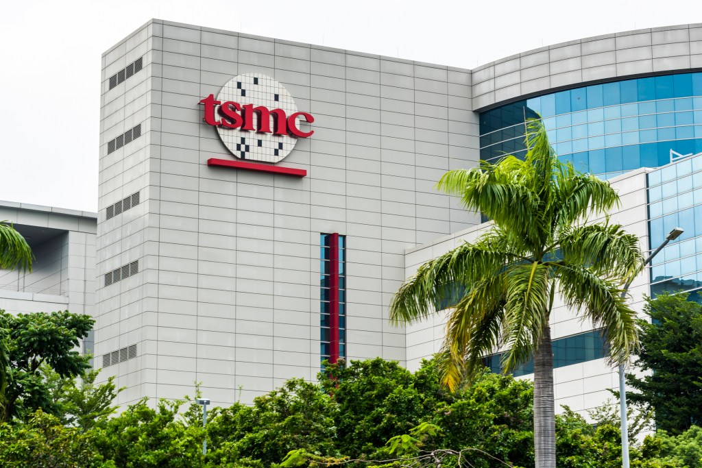 TSMC headquarters building with red company logo, Sony's manufacturing partner for the new Kumamoto image sensor plant