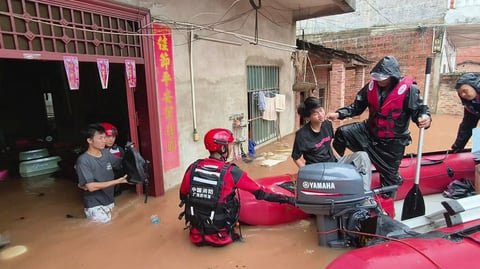 Brown floodwaters engulf streets in Guangxi as Typhoon Narra causes severe flooding across southern China